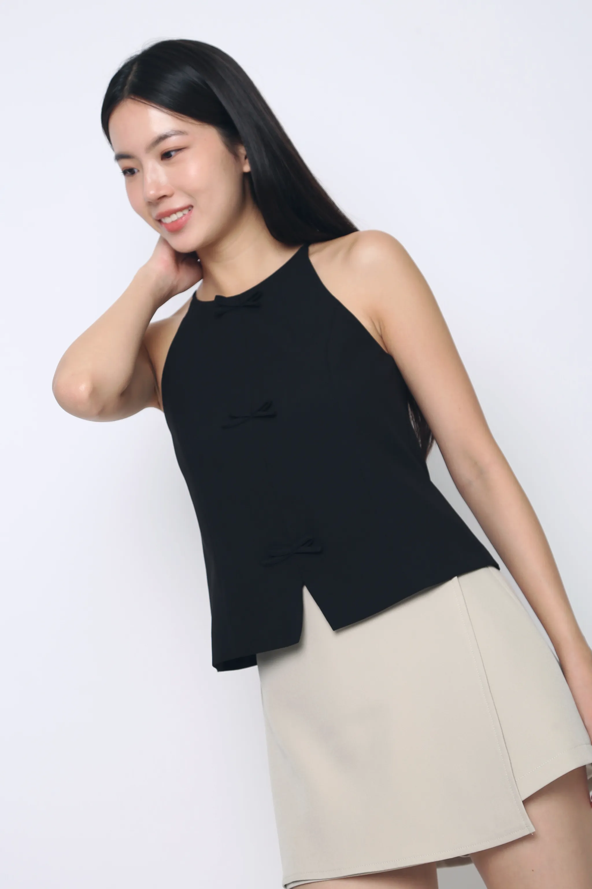 Contemporary Cut Bow Alert Strappy Top Black