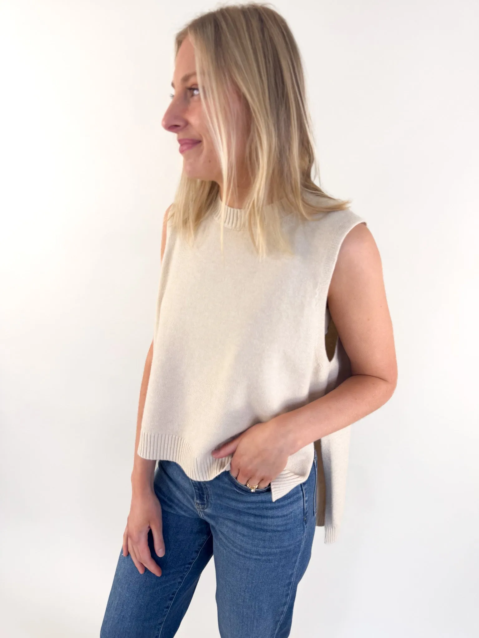 Ember Sleeveless Sweater Curved Hemline