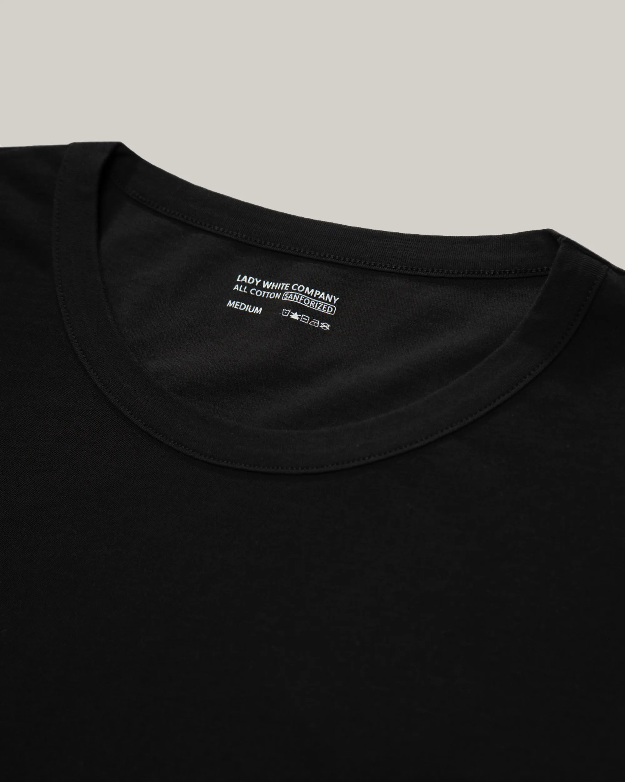 Ergonomic Cut LADY WHITE CO. SLEEVELESS TEE - BLACK