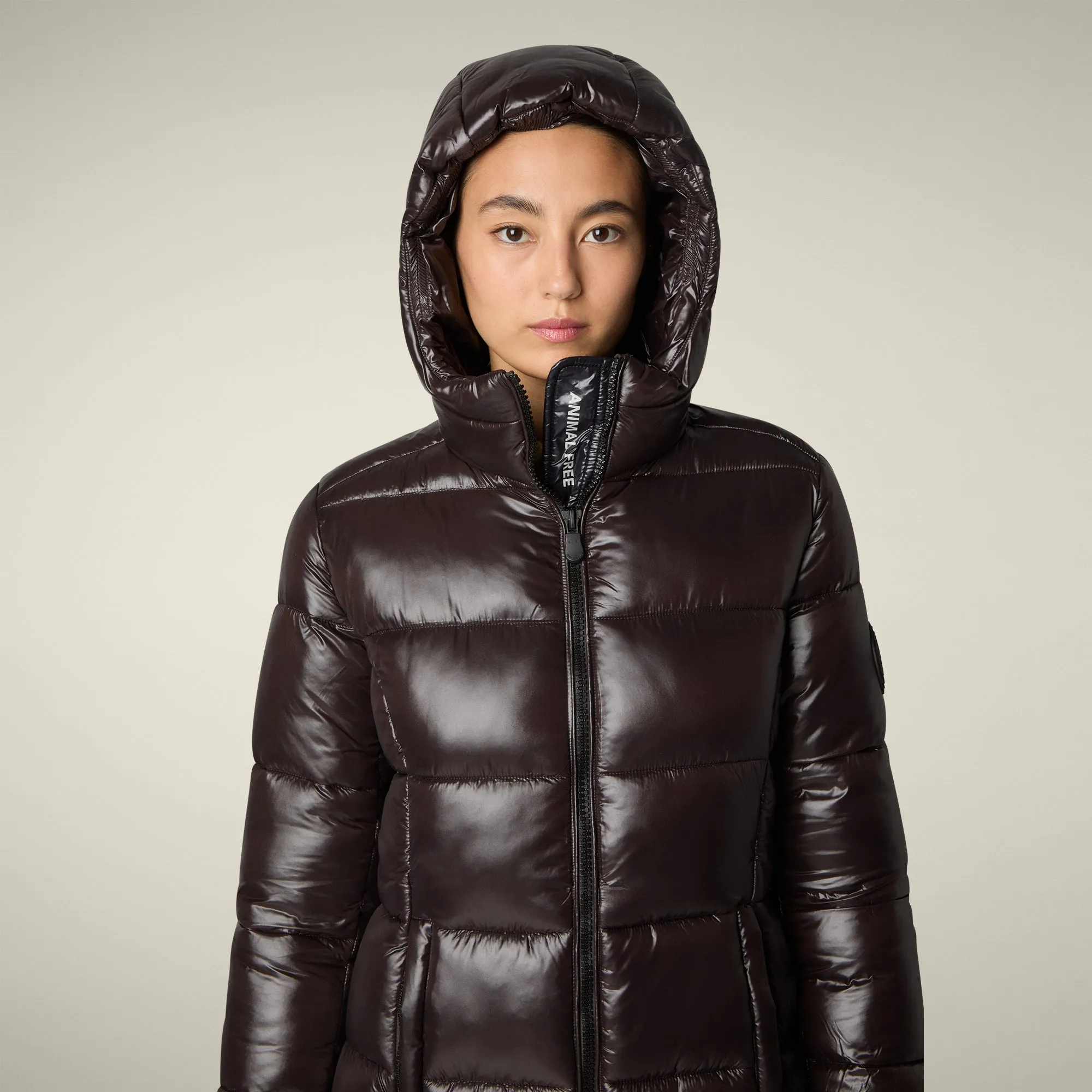 Women's Animal free puffer Coat ines in brown black Enhanced Edge Binding