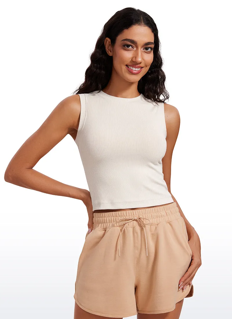 Ribbed Waist Length High Neck Tank Layered Hem Moisture Wicking Technology