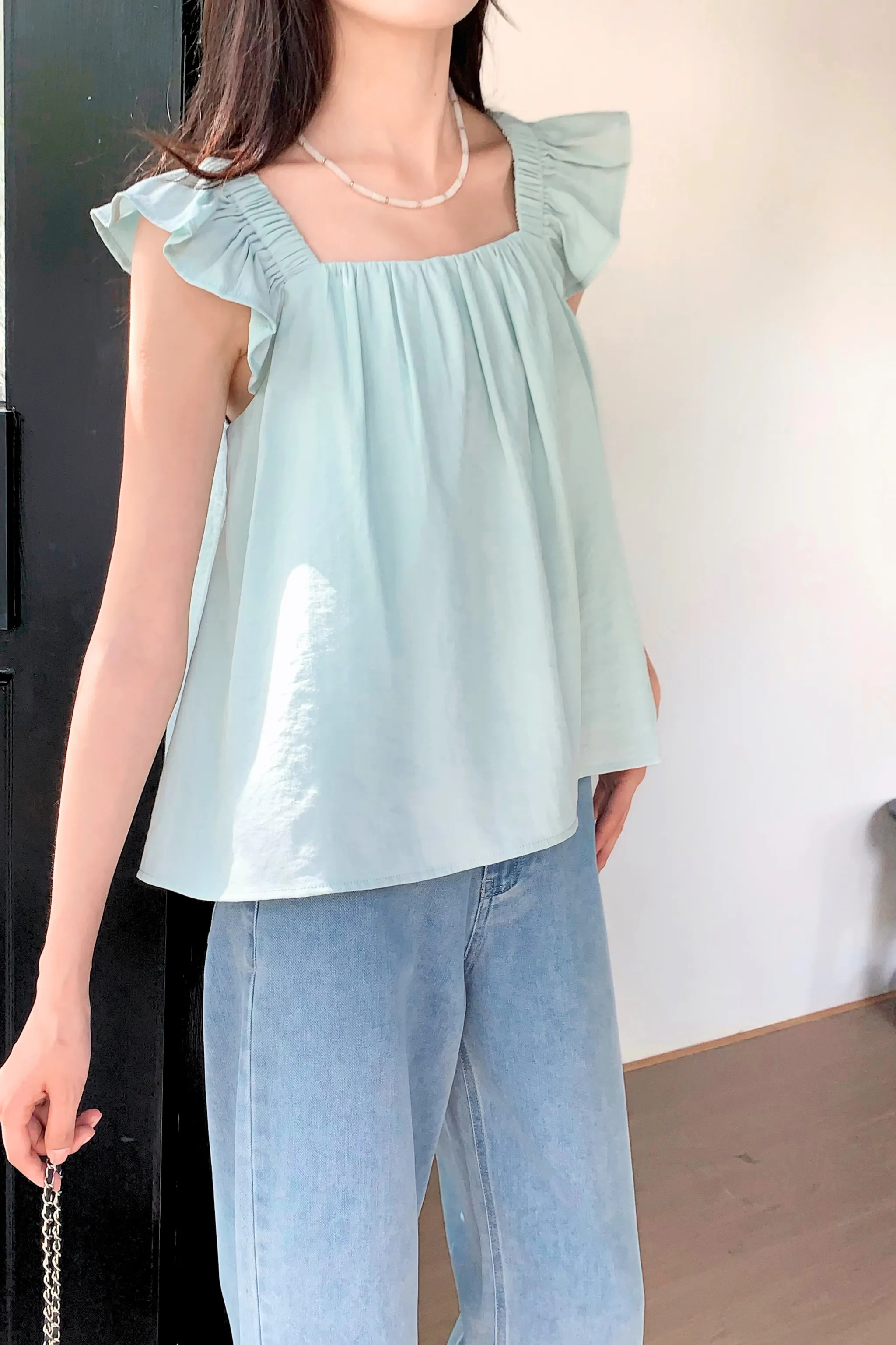 Sweet Pea Flutter Top Ice Blue Sustainable Manufacturing Process
