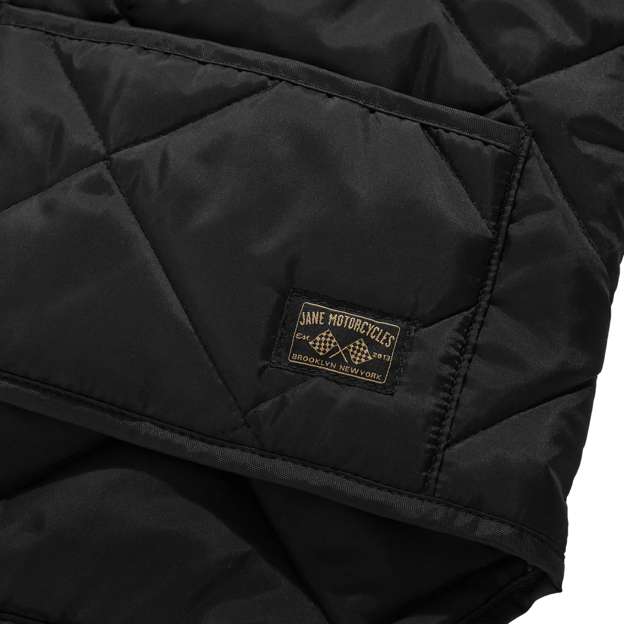 THE UNION QUILTED VEST - Black Flexible Joint Articulation