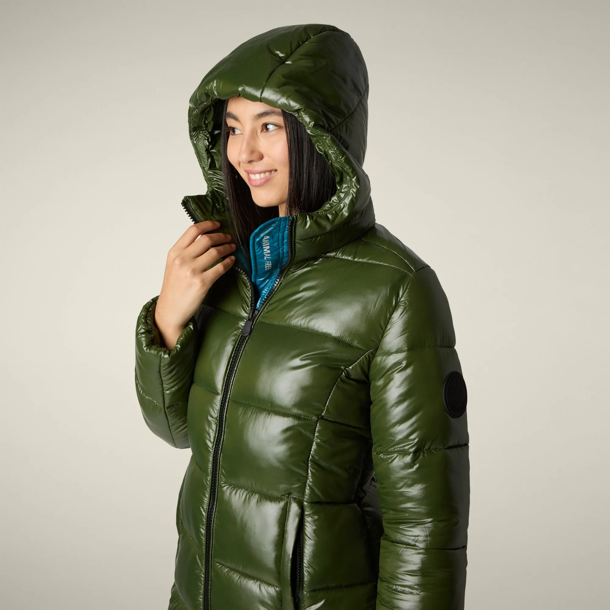 Warm Layers Thermal Reflective Lining Women's Animal free puffer Coat ines in pine green